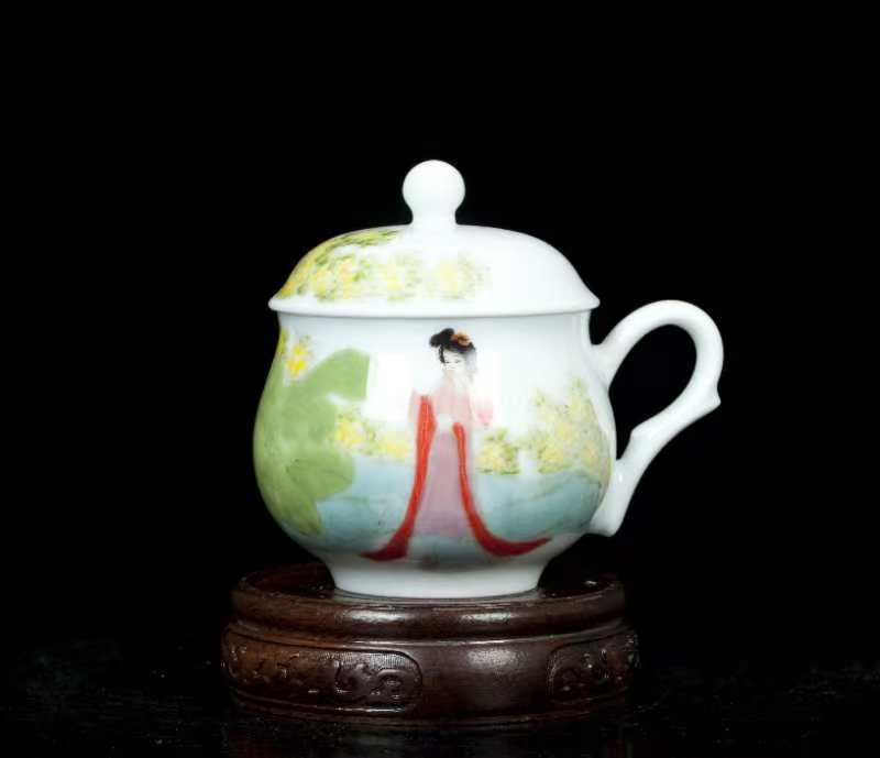 Hand-painted coffee cup with ancient ladies.