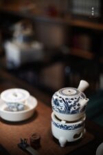 Soda Glaze Blue and White Fish Motif Side-handle Teapot - Image 4